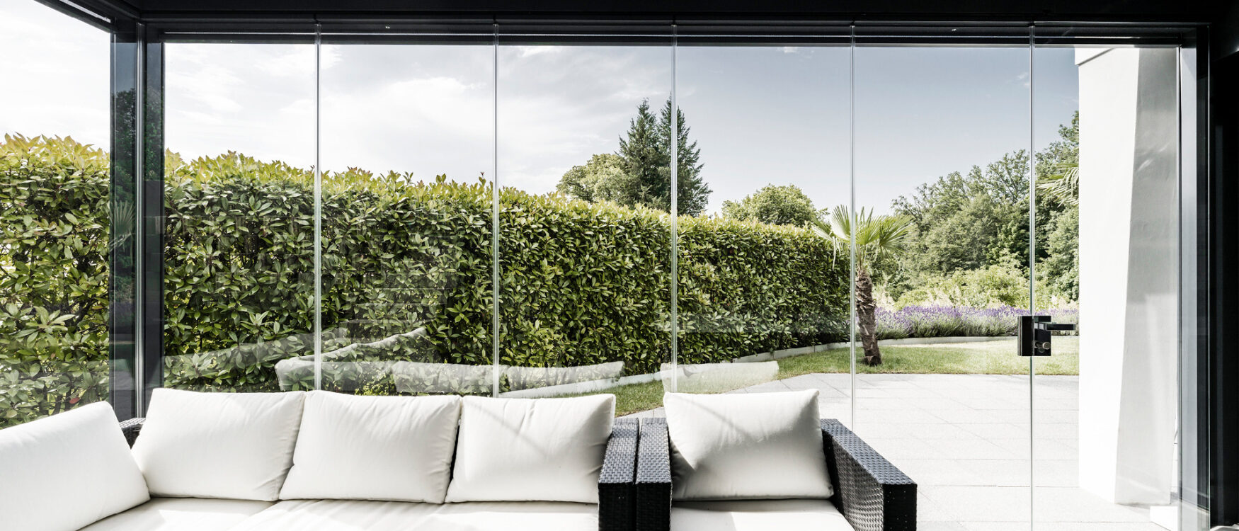 Balkonverglasungen, Ganzglas-Schiebefaltwand, Erweiterung Wohnraum